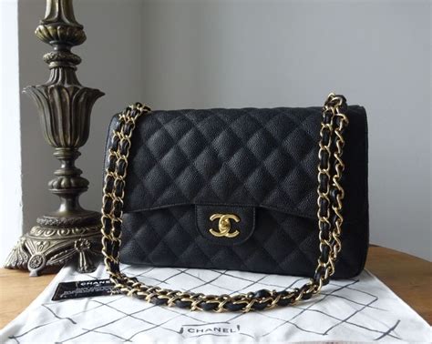 Vintage CHANEL black 2.55 jumbo caviar large shoulder bag